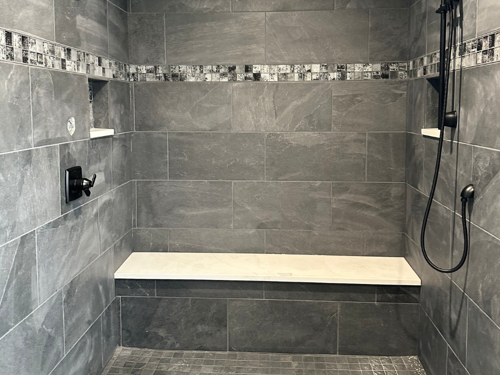 large gray tiled walk in shower